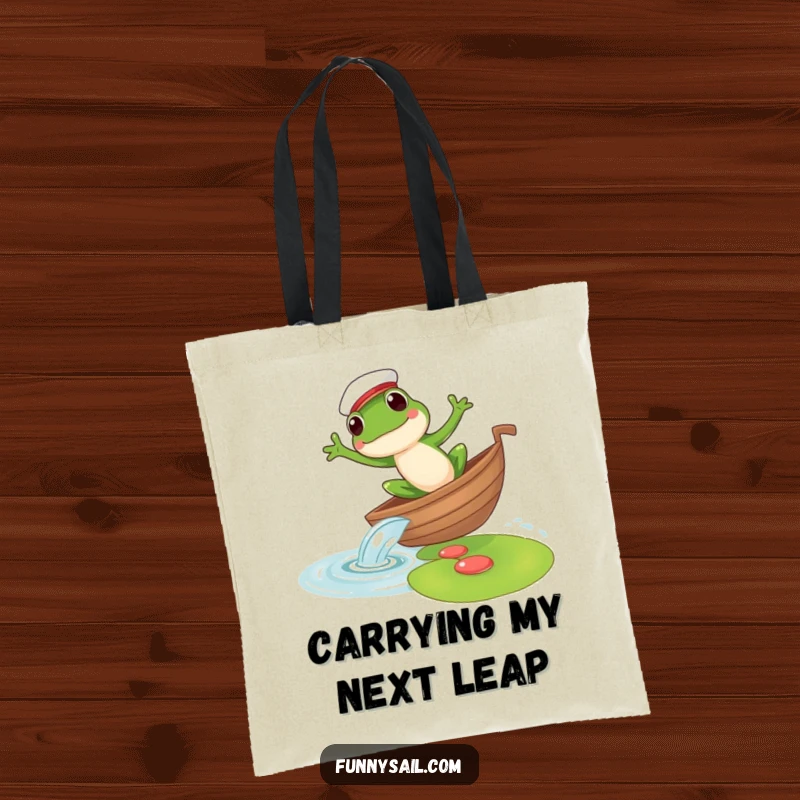 Funny tote bag featuring a frog sailor leaping from a boat to a lily pad, perfect for carrying essentials with nautical flair.